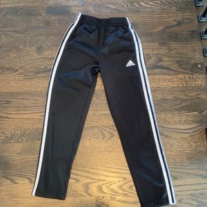 Girls Adidas track pants.